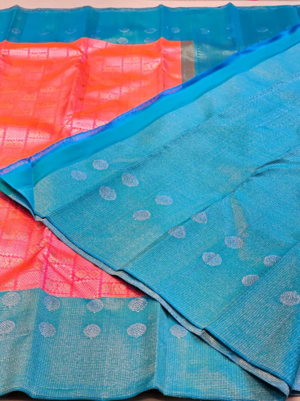 Kanchipuram silks - Coral Pink with Peacock Blue & Silver Zari