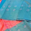 Kanchipuram silks - Coral Pink with Peacock Blue & Silver Zari