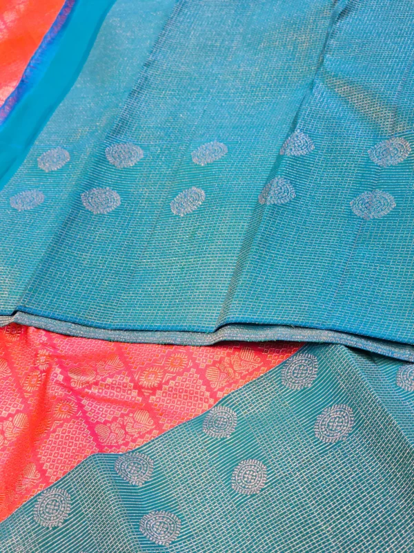 Kanchipuram silks - Coral Pink with Peacock Blue & Silver Zari
